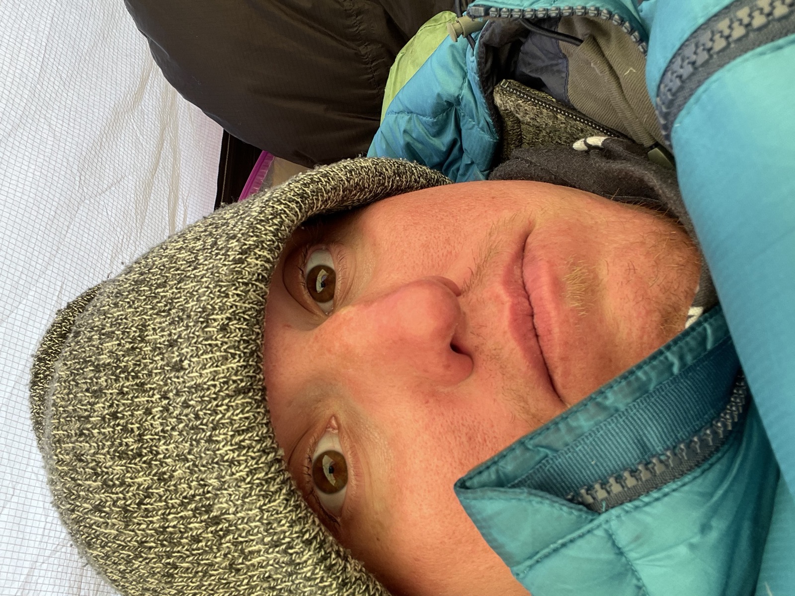 Jared Mattingly bundled up in a tent